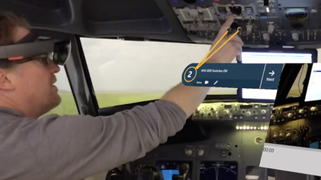 man performing training in a cockpit with digital instructions