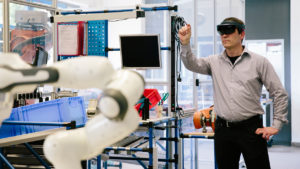 man in a lab using an augmented reality headset