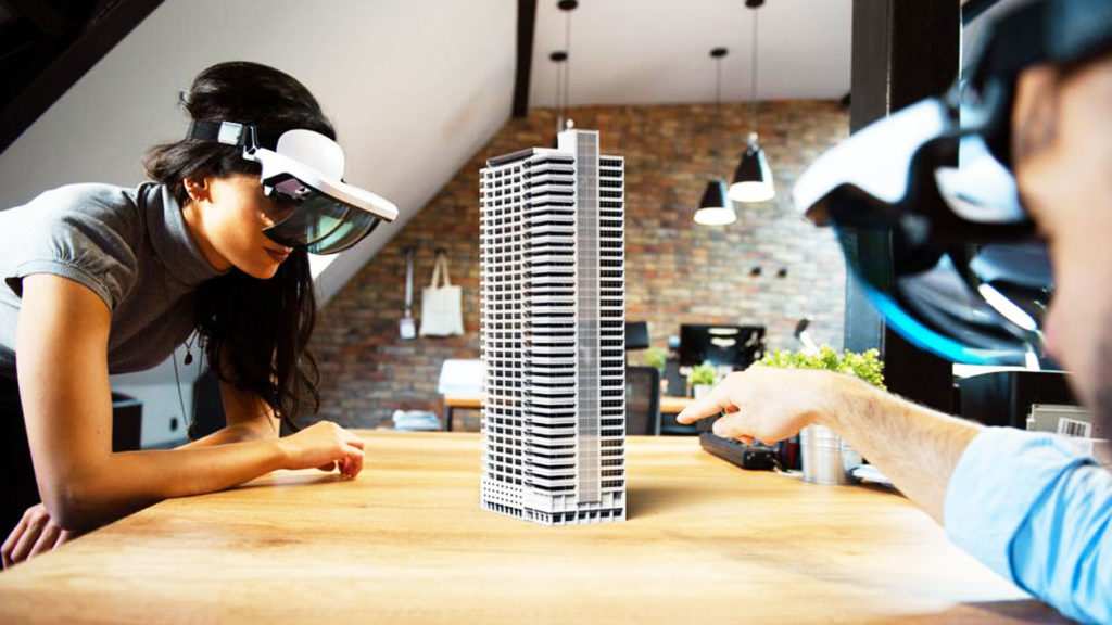 people looking through ar headsets at an augmented building