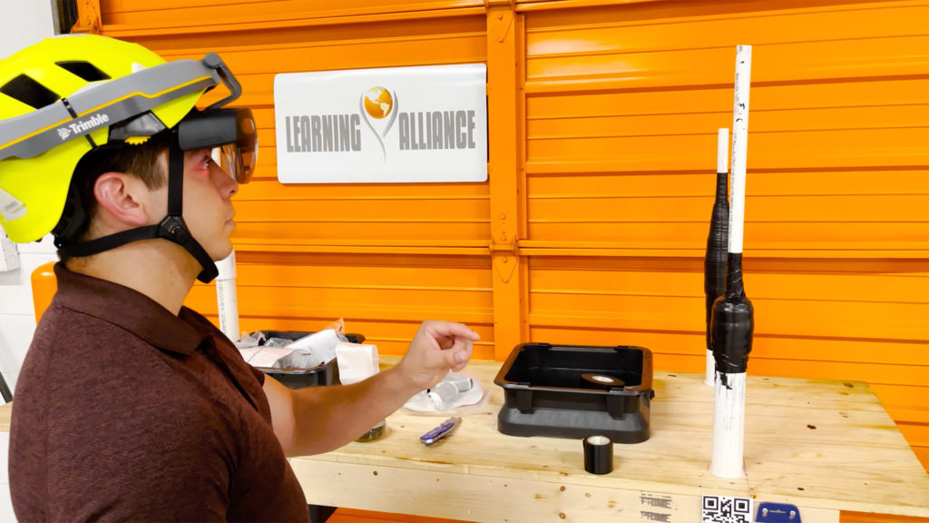 man at learning alliance using ar headset