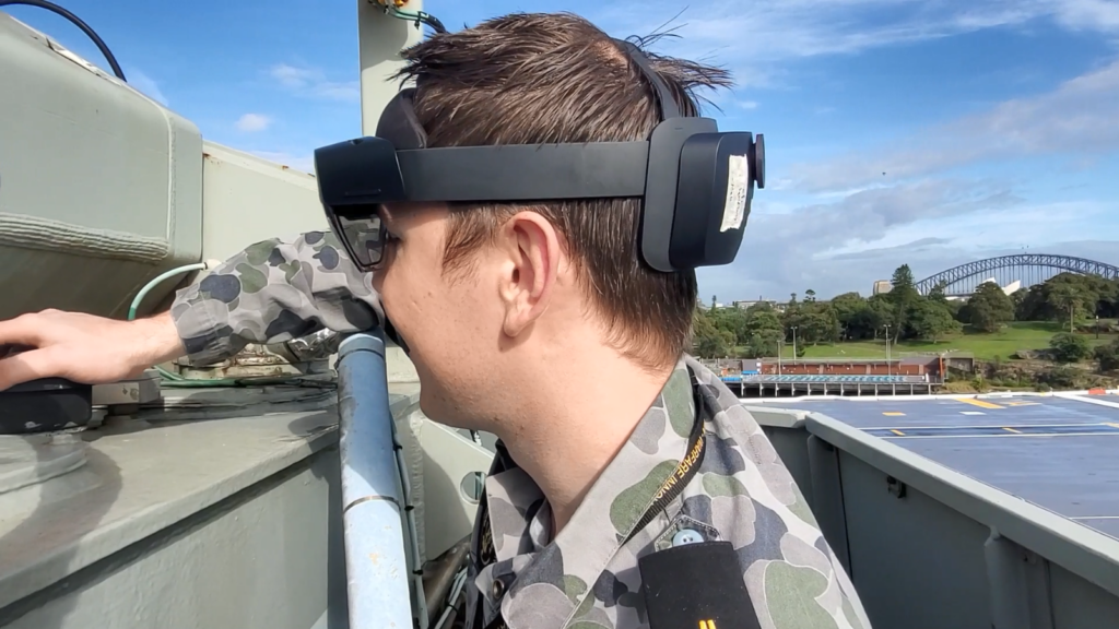 soldier operating on a vehicle using augmented reality headset